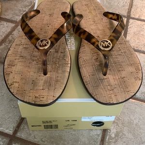 Micheal Kors flip flops